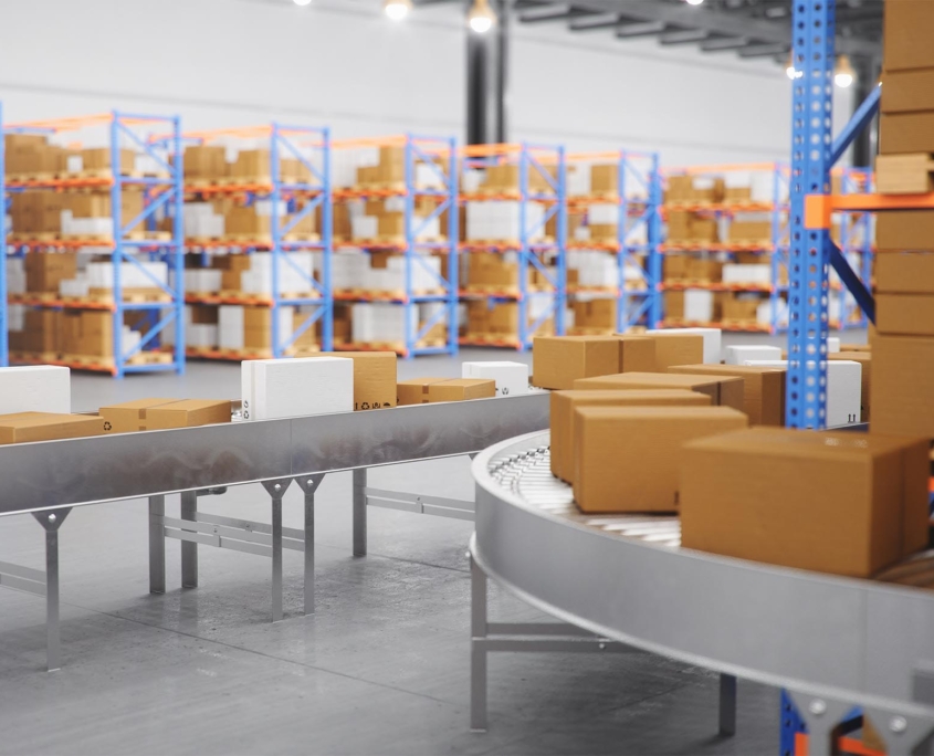 Conveyor system transporting boxes in warehouse