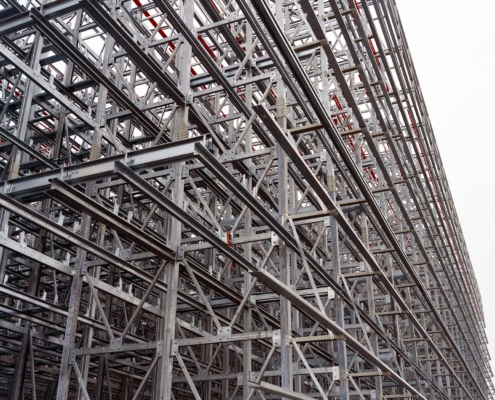 Close up photograph of steel structure clad rack warehouse