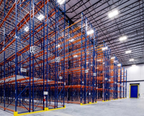 Interior of modern warehouse with empty racking system design for cold storage