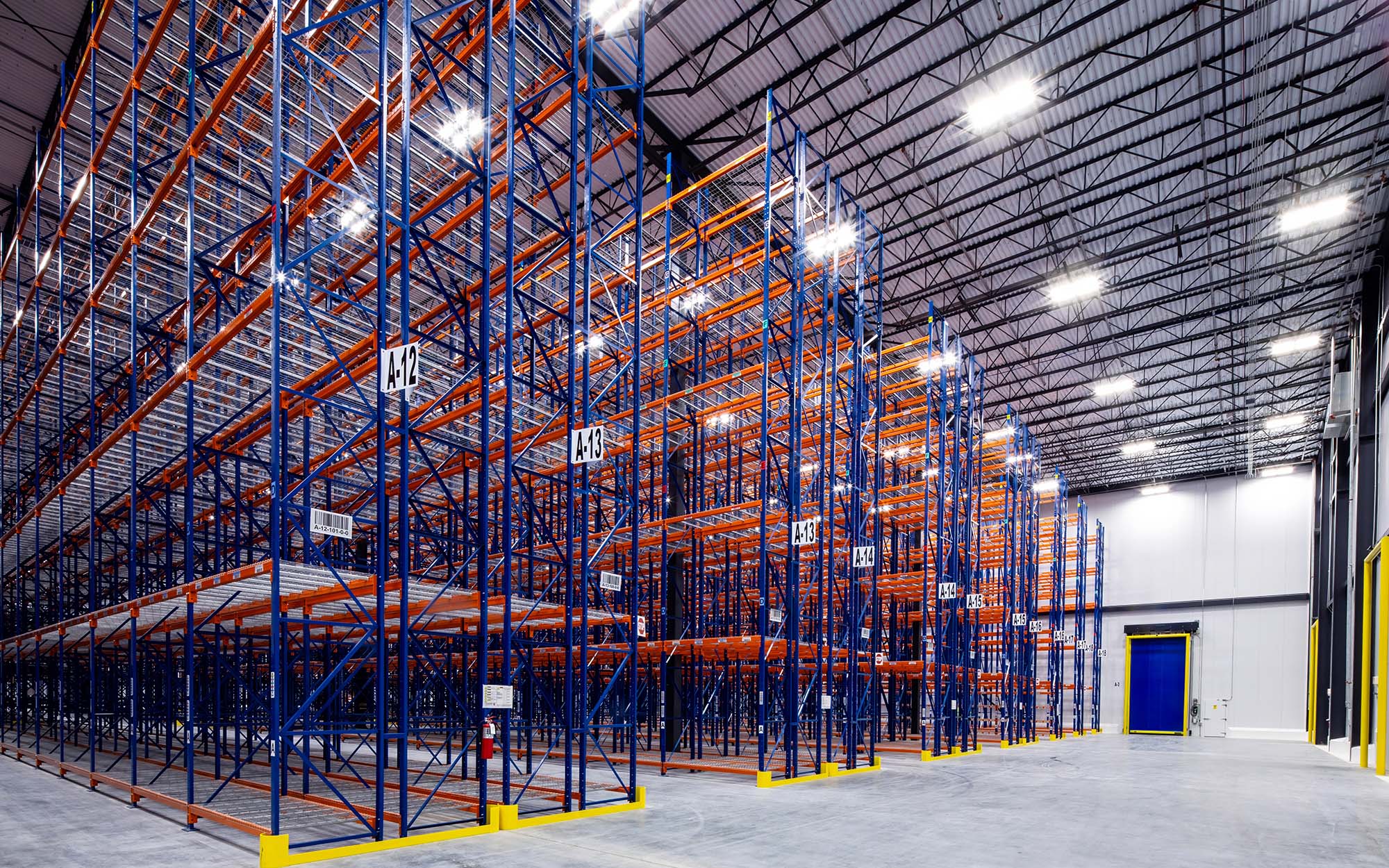 Interior of modern warehouse with empty racking system design for cold storage